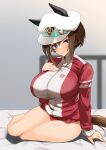  1girl animal_ears bare_legs blue_eyes blurry blurry_background breasts brown_hair cheval_grand_(umamusume) closed_mouth commentary ear_covers ears_through_headwear english_commentary hat highres horse_ears horse_girl horse_tail huge_breasts jacket komb long_sleeves looking_at_viewer short_hair sidelocks sitting tail track_jacket track_suit umamusume white_headwear 