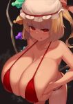 1girl absurdres alternate_breast_size bikini blonde_hair breasts cleavage closed_mouth collarbone facominn flandre_scarlet hat highres huge_breasts long_hair looking_at_viewer red_bikini smile solo standing swimsuit tongue tongue_out touhou wings 
