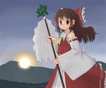  ascot bow brown_eyes brown_hair detached_sleeves hair_bow hair_tubes hakurei_reimu looking_at_viewer looking_to_the_side outdoors red_bow red_skirt ribbon-trimmed_sleeves ribbon_trim skirt skirt_set smile solo sunrise sunset touhou vest wide_sleeves 