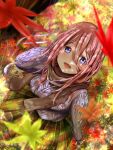  1girl :d absurdres aran_sweater autumn_leaves blue_eyes blue_sweater breasts brown_hair brown_scarf brown_skirt cable_knit commentary_request falling_leaves from_above go-toubun_no_hanayome green_skirt highres large_breasts leaf long_hair long_hair_between_eyes long_sleeves looking_at_viewer maple_leaf nakano_miku outdoors parutaru_(partal) scarf skirt smile solo sweater two-tone_skirt 