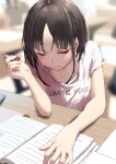  2girls black_hair blurry blurry_background closed_eyes closed_mouth clothes_writing collarbone commentary_request english_text holding holding_pen jonsun misaki_(jonsun) multiple_girls original pen short_hair sitting solo solo_focus table twitter_username 