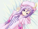  bed bow crescent crescent_hair_ornament hair_ornament hair_ribbon hat leo.k long_hair lying patchouli_knowledge pink_bow purple_eyes purple_hair ribbon robe solo touhou 