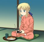  a1 ahoge artoria_pendragon_(all) blonde_hair dorayaki fate/stay_night fate_(series) flat_chest food game_console green_eyes indian_style long_sleeves pillow playing_games playstation_2 saber sitting solo video_game wagashi 