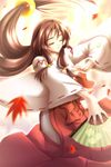  brown_hair closed_eyes dancing fan folding_fan hakama highres japanese_clothes leaf long_hair long_sleeves masaharu miko red_hakama sakakibara_kukuri solo tokidoki_sugar 