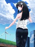  black_hair building camisole casual cloud day denim flower green_eyes hair_flower hair_ornament highres jeans lens_flare long_hair looking_back pants ryou@ryou saten_ruiko solo thigh_gap to_aru_kagaku_no_railgun to_aru_majutsu_no_index wind_turbine windmill 