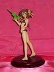  bikini brown_hair figure gun photo short_hair solo suzumiya_haruhi suzumiya_haruhi_no_yuuutsu swimsuit water_gun weapon wonder_festival wonder_festival_2007 