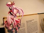  bad_id bad_pixiv_id book bookmark hoshi_nawoki paper_child papercraft patchouli_knowledge photo reading sitting solo touhou 