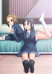  akiyama_mio bed black_eyes black_hair brown_eyes brown_hair cable_divider digital_media_player earphones earphones_removed feet hairband k-on! long_hair lying multiple_girls on_stomach sayousuke school_uniform short_hair sitting socks tainaka_ritsu 