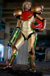  1girl arm_cannon armor blonde_hair cosplay helmet metroid nintendo photo pixel_ninja power_armor samus_aran varia_suit weapon 