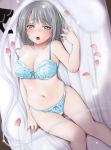  1girl bangs bare_arms bare_shoulders bed_sheet black_ribbon blue_bra blue_panties blurry blurry_foreground blush bow bow_bra bow_panties bra breasts cleavage collarbone commentary_request depth_of_field dutch_angle eyebrows_visible_through_hair green_eyes grey_hair hand_up konpaku_youmu konpaku_youmu_(ghost) kozue_akari lingerie looking_at_viewer lying medium_breasts navel on_back open_mouth panties petals ribbon thigh_gap touhou underwear underwear_only 