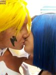  2girls apache armor armpits arrancar bleach blonde_hair blue_hair cosplay dark_skin espada eyes_closed facial_mark gloves kiss kissing lips photo real release_form short_hair tia_harribel yuri 