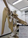  cardboard_box cardboard_box_gundam freedom_gundam gundam gundam_seed gundam_seed_destiny highres mecha no_humans photo poyoloco sign string text_focus too_literal 