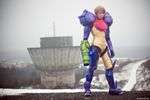  1girl arm_cannon armor blonde_hair cosplay gravity_suit metroid neon_trim nintendo photo pixel_ninja power_armor samus_aran weapon 