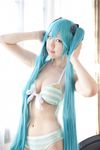  aqua_eyes aqua_hair asian bikini cosplay hatsune_miku headset long_hair pantyhose pantyhose_under_swimsuit photo solo swimsuit twintails vocaloid yatoshi_riya 