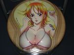  bikini boobpad breast_mousepad breasts cleavage female large_breasts mousepad nami nami_(one_piece) one_piece orange_hair photo short_hair solo swimsuit tattoo 