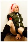  1girl boots cosplay flak_jacket haruno_sakura legs naruto photo pink_hair real short_hair smile solo thighs vest 