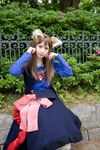  andou_kana animal_ears boots cosplay dress female horo human ookami_to_koushinryou ookamimimi real solo unknown_artist 