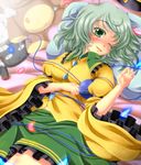  archienemy bed blush breasts dress eyeball frilled_dress frills green_eyes green_hair hat hat_removed headwear_removed komeiji_koishi lying medium_breasts one_eye_closed short_hair solo stuffed_animal stuffed_toy third_eye touhou 