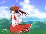  blue_sky bow brown_eyes brown_hair cloud cross_(crossryou) day detached_sleeves dress gohei grass hair_bow hair_tubes hakurei_reimu mountain nature outdoors ponytail red_dress sky solo touhou wide_sleeves wind 