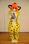  animal_ears bodysuit cat_eyes cheetah cosplay costume crossdress crossdressing feline furry fursuit hair highres holding leopard looking_at_viewer magazine male mammal mask orange_hair photo presenting real skinsuit slit_pupils solo standing tashiro_yuu tetetor-oort tirol 