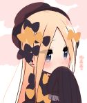  1girl abigail_williams_(fate/grand_order) bangs black_bow black_dress black_hat blonde_hair blue_eyes blush bow covered_mouth dress eyebrows_visible_through_hair eyes_visible_through_hair fate/grand_order fate_(series) forehead hair_bow hand_up hat long_hair long_sleeves looking_away nose_blush orange_bow parted_bangs sleeves_past_fingers sleeves_past_wrists solo translation_request upper_body very_long_hair yoru_nai 