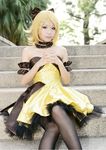 aku_no_musume_(vocaloid) bare_shoulders cosplay dress kagamine_rin lowres sitting solo vocaloid 
