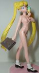  1girl angel bag bishoujo_senshi_sailor_moon blonde_hair blue_eyes figure food ice_cream nipples nude photo school_bag solo tsukino_usagi wink 