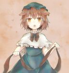  1girl alternate_costume animal_ear_piercing black_bow black_bowtie blush bow bowtie brown_eyes brown_hair capelet chaki_(kinaneko2149) chen commentary_request cowboy_shot dot_nose dress earrings ears_down frilled_capelet frills green_dress green_headwear grey_background hair_between_eyes half-closed_eyes hat heart highres holding holding_ribbon jewelry looking_at_viewer mob_cap open_mouth ribbon simple_background single_earring solo teeth touhou upper_teeth_only white_capelet 