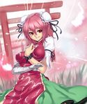  bandages breasts bun_cover chain cuffs double_bun dress flower grass grin hand_on_own_chest highres houtengeki ibaraki_kasen medium_breasts multiple_torii petals pink_hair red_eyes ribbon shackles short_hair smile solo tabard torii touhou wind 