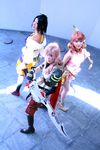  3girls black_eyes cosplay female final_fantasy final_fantasy_xiii lebreau lebreau_(cosplay) lightning lightning_farron lightning_farron_(cosplay) multiple_girls oerba_dia_vanille oerba_dia_vanille_(cosplay) photo pink_hair sexy vanille weapon 