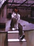  :&lt; abe_yoshitoshi absurdres artbook brown_eyes brown_hair can casual drink drum drum_set highres instrument iwakura_lain looking_back official_art scan serial_experiments_lain short_hair sitting solo speaker stage stage_lights stairs 
