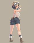  ass bike_shorts biting black_eyes black_hair boots brown_eyes from_behind glove_biting gloves goggles halterneck hat looking_back mouth_hold original pantylines shorts simple_background solo standing tank_top weno 