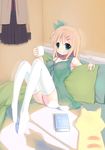  blonde_hair blue_eyes blush book camisole cat cup hair_ornament hair_ribbon hairclip looking_at_viewer no_shoes on_bed original pillow ribbon ririko_(zhuoyandesailaer) sitting smile solo thighhighs white_legwear 