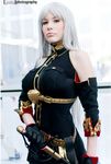  breasts cosplay crystal_graziano non-asian photo red_eyes selvaria_bles selvaria_bles_(cosplay) senjou_no_valkyria senjou_no_valkyria_1 silver_hair 