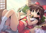  book bow brown_eyes brown_hair detached_sleeves food hair_bow hakurei_reimu kurogarasu short_hair solo touhou 