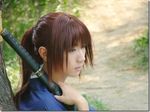  cosplay himura_kenshin himura_kenshin_(cosplay) lowres photo red_hair rurouni_kenshin sword weapon 