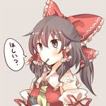  ascot bad_id bad_pixiv_id black_hair blush bow detached_sleeves dress eating food food_in_mouth grey_eyes hair_bow hair_tubes hakurei_reimu pasutel pocky red_dress ribbon solo touhou translated 