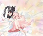  animal_ears azuma_ezu barefoot bed_sheet black_hair bunny_ears carrot_necklace dress inaba_tewi looking_at_viewer lying on_side pink_dress red_eyes short_hair short_sleeves solo touhou 