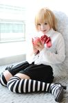  amane_misa apple cosplay death_note food fruit high_heels kipi-san photo shoes striped thigh-highs thighhighs 