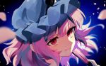  1girl blue_background blurry blurry_background frilled_hat frills hand_fan hat highres looking_at_viewer maguri_rei mob_cap pink_eyes pink_hair saigyouji_yuyuko smile solo touhou 