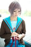  book cardigan cosplay glasses highres nagato_yuki photo sailor sailor_uniform school_uniform serafuku suzumiya_haruhi_no_yuuutsu tamaki_shuri 