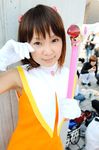  card_captor_sakura cheerleader child cosplay gloves hiromichi kinomoto_sakura photo pom_poms wand 