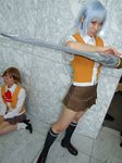  blue_hair cosplay knee_socks kneehighs mai_hime miyu_greer my-hime photo school_uniform serafuku sword_arm tamaki_shuri 