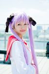  cosplay hair_ribbon hair_ribbons highres hiiragi_kagami lucky_star momiji photo purple_hair ribbon sailor sailor_uniform school_uniform serafuku twintails 