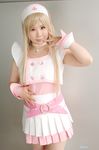  blonde_hair cosplay dream_of_doll nurse nurse_uniform photo thigh-highs thighhighs twingky yuuna 