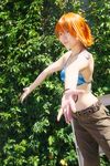  1girl amanone_shun asian belt bikini_top bracelet camouflage cargo_shorts cosplay female jewelry midriff nami nami_(cosplay) nami_(one_piece) nami_(one_piece)_(cosplay) one_piece orange_hair outdoors photo plant skypiea solo tattoo 