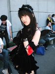  arm_laces collar cosplay gloves highres maid maid_apron maid_uniform morte photo suzuyuki_kaho thigh-highs thighhighs vispo_original wings 