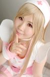  blonde_hair cosplay dream_of_doll nurse nurse_uniform photo thigh-highs thighhighs twingky yuuna zettai_ryouiki 