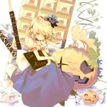  blonde_hair book candy chocolate dress eyes_closed food halloween pocky pumpkin saya_(sayaya) short_hair sleeping solo sweets 