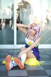  bow cheerleader cosplay hair_bow hairbow highres hiiragi_tsukasa lucky_star maritsuki_haru photo pom_poms purple_hair real upskirt 